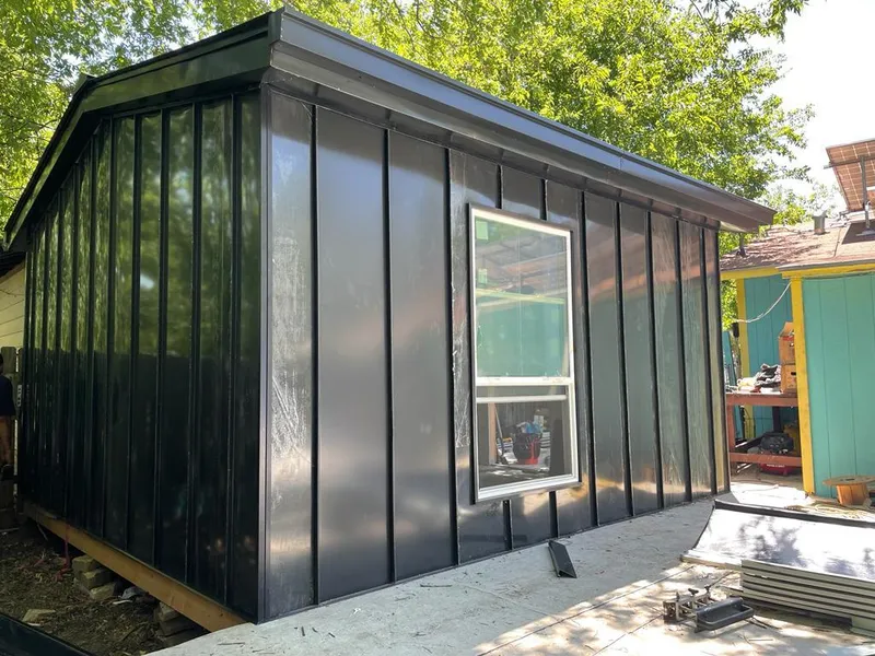 Black standing seam metal wall panels for Roof Inspection in Lauderhill